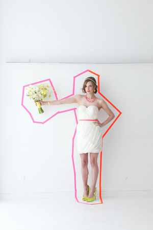 neon wedding with tape backdrop