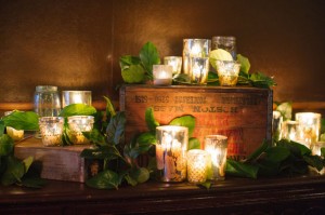 candle and ivy wedding arrangement