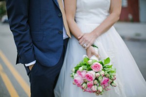 wedding couple with pink bouquet