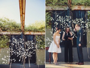 outdoor ceremony in front of white garland