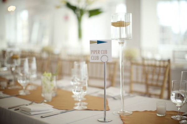 modern white and gold reception table