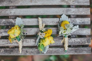 yellow and grey boutonnieres
