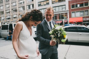 pregnant bride and groom