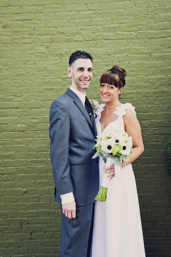 green building bride and groom