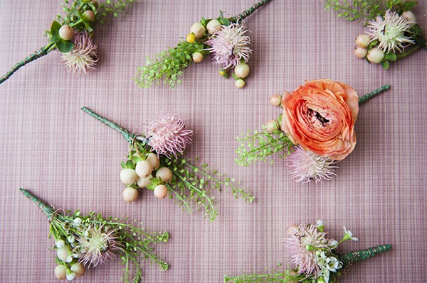 pink and green boutonnieres
