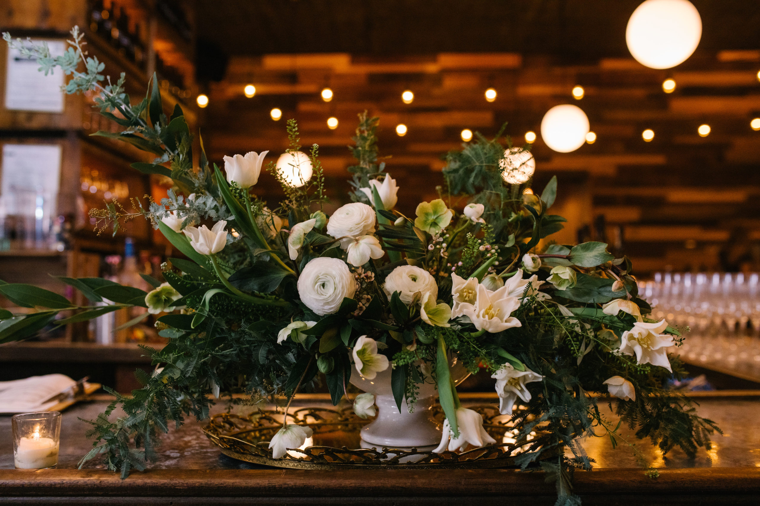 White Centerpiece with Greenery