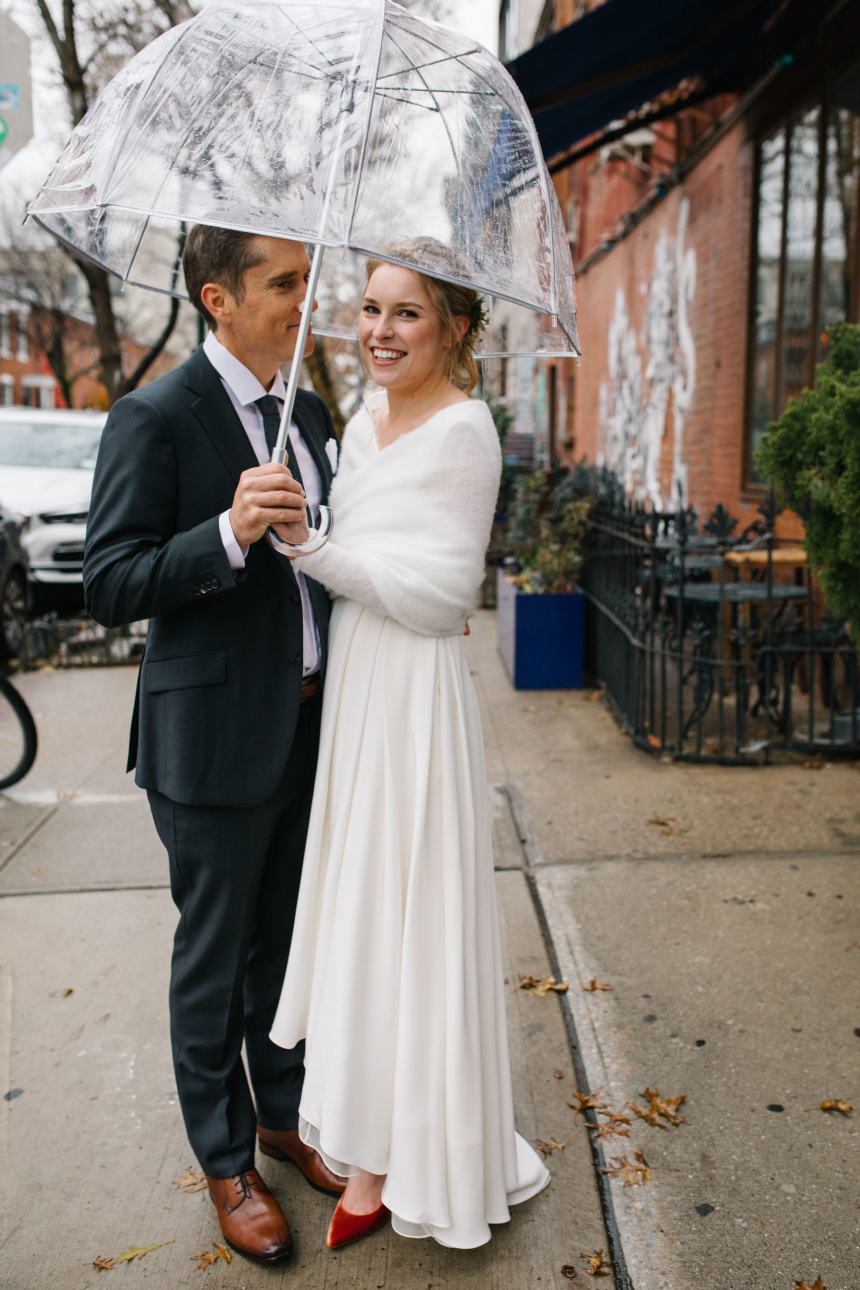 Clear Umbrella on a Rainy Wedding Day