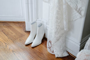 white boots and lace bohemian wedding dress